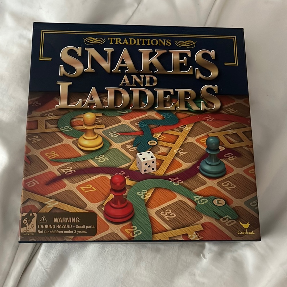 Snakes and ladders board game